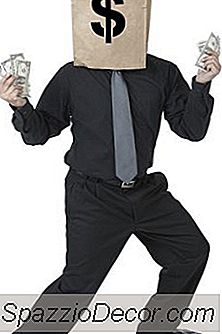 Como Um Dividendo Ganho De Capital Afeta A Base De Custo Ajustado?