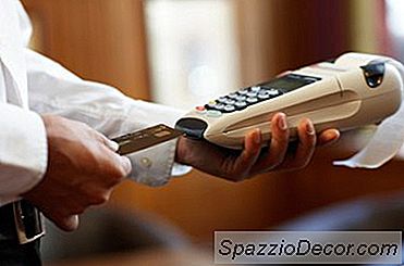 Aturan Visa Tentang Biaya Kartu Kredit