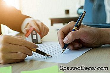 Quando Você Deve Assinar Um Contrato Fiduciário Ao Vender Sua Casa?